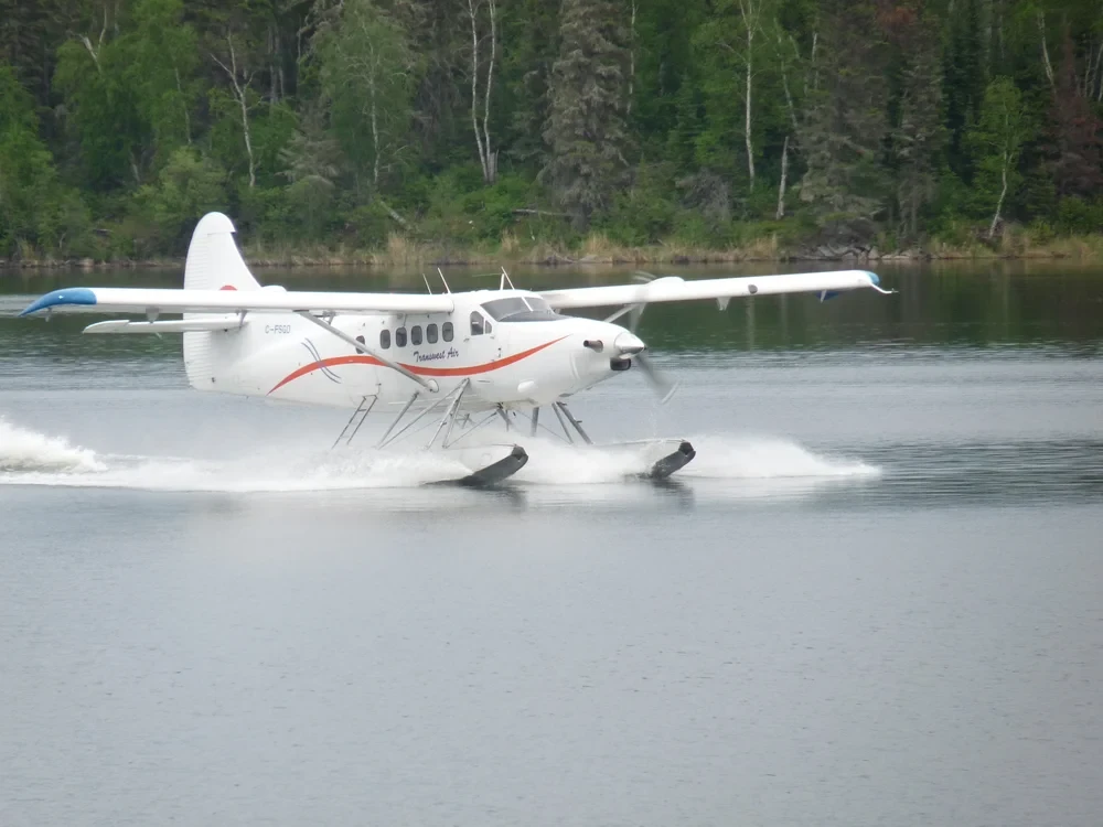 Transwest Air floatplane landing on the wilderness lake
